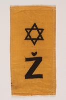 2002.432.2 front
Rectangular yellow badge with Star of David and Ž kept by hidden child

Click to enlarge