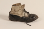 Pair of toddler's well used black and white leather lace-up boots worn in Theresienstadt ghetto/labor camp