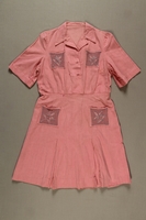 2003.144.2 front
Pink embroidered dress made from flour sacks in Athens after liberation

Click to enlarge