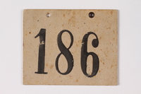 1989.215.2 front
Numbered ID sign issued to a Jewish Austrian boy for the Kindertransport

Click to enlarge