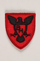2000.561.2 front
US Army 86th Infantry Division shoulder sleeve patch with a black hawk with spread wings on a red field

Click to enlarge