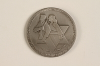 2004.217.4_a front
Israeli medallion with case issued to commemorate Jewish resistance during WWII

Click to enlarge