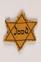 Yellow cloth Star of David badge with the word Jood