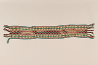 2004.485.7 front
Multicolored woven wool scarf brought to the US by a German Jewish refugee

Click to enlarge