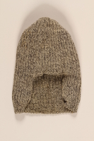 2004.485.15 front
Black and white tweed patterned wool knit hat brought to the US by a German Jewish refugee

Click to enlarge
