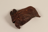 2004.485.30 front
Brown leather right hand glove brought to the US by a German Jewish refugee

Click to enlarge