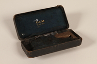 1999.150.1_b open
Gem micromatic safety razor and case given to a concentration camp inmate after liberation

Click to enlarge