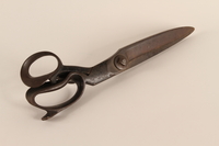2004.704.5 back
Very large Henckels fabric shears from the family capmaking business brought to the US by a Jewish refugee

Click to enlarge