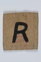 2004.706.7 front
Cloth badge with an R for Rustung (Armament) worn by a Polish Jewish worker in Beskiden labor camp

Click to enlarge