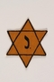 Star of David badge with letter J owned by Jewish Belgian couple