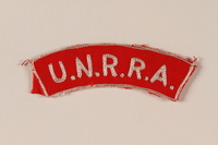 2005.379.3 front
UNRRA red cloth patch with acronym worn by a refugee aid worker

Click to enlarge