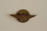2005.379.9 front
Wing shaped Portuguese Air Force pin given to a young Jewish refugee by friends in Lisbon

Click to enlarge