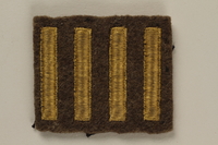 2005.416.22 front
US Army soldier's green felt military patch with 4 gold stripes

Click to enlarge