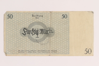 2005.450.6 front
Łódź ghetto scrip, 50 mark note, given to a survivor searching for relatives

Click to enlarge