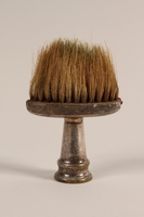 2005.457.35 front
Barber's professional brush used in a concentration camp

Click to enlarge