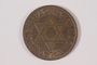 Souvenir coin with a swastika and Star of David owned by a young German Jewish girl