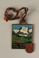 2006.19.18 front
Decorative medal with a Swiss town and alps owned by a German Jewish businessman in Shanghai

Click to enlarge