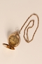 Pocket watch with chain traded for food by a concentration camp inmate and recovered postwar