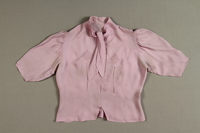 2007.175.2 front
Lavender blouse with tie worn during a young woman's escape from the Warsaw ghetto

Click to enlarge