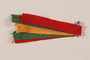 Boy Scout ribbons in yellow, green, and red worn by a Jewish refugee in Shanghai