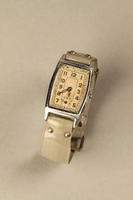 2002.270.2 front detail
Wrist watch with a gray plastic band

Click to enlarge