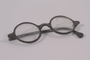 Black Bakelite circular eyeglasses worn by a Hungarian Jewish man on the Kasztner train