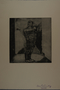 Drypoint etching by Lea Grundig of a man wrapped in rope up to his neck