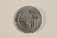 2003.460.4 front
Łódź (Litzmannstadt) ghetto scrip, 10 mark coin acquired by Polish Jewish survivor

Click to enlarge