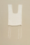 White cotton tallit katan used by a Polish Jewish elder