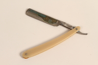 2004.523.5 open
Straight razor with an offwhite plastic handle used by a Polish Jewish refugee conscripted as a shoemaker by the Soviet Army

Click to enlarge