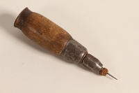 2004.523.10 front
Straight half inch stitching awl used by a Polish Jewish refugee conscripted as a shoemaker by the Soviet Army

Click to enlarge