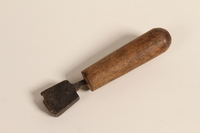 2004.523.14 front
Dark gray edge iron shoemaking tool used by a Polish Jewish refugee conscripted as a shoemaker by the Soviet Army

Click to enlarge