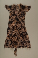 2004.628.6 front
Pink and black floral patterned chiffon dress owned by a Jewish refugee from Austria

Click to enlarge