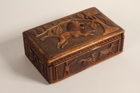 2004.630.3 closed
Carved wooden box handmade and used in the Łódź Ghetto

Click to enlarge