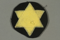 2016.487.1 front
Circular patch with a yellow Star of David worn by a Jewish Romanian woman

Click to enlarge