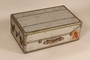 Embossed aluminum flat top steamer trunk used by a German Jewish refugee