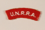 Red UNRRA patch worn by a former concentration camp inmate and DP aid worker