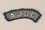 AJDC bar patch worn by a former concentration camp inmate and refugee aid worker