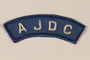 Blue AJDC patch worn by a former concentration camp inmate and refugee aid worker