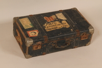 2004.286.2 front
Dark blue paper covered suitcase used by a Jewish refugee

Click to enlarge