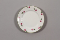 2015.365.4 front
China plate with floral  border recovered by a German Jewish family postwar

Click to enlarge