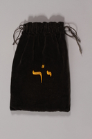 2015.365.7 front
Monogrammed gray velvet tefillin bag carried by a young German Jewish Kindertransport refugee

Click to enlarge