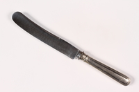 2012.493.4 left
Monogrammed dinner knife brought with a German Jewish prewar refugee

Click to enlarge