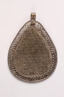 2015.563.2 back
Teardrop pendant with an engraved inscription

Click to enlarge