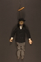 Wooden marionette dressed as a Jewish banker