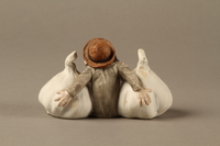 2016.184.31 back
Bisque coin bank in the shape of a Jew with a garlic bulb under each arm

Click to enlarge