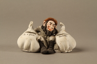 2016.184.31 front
Bisque coin bank in the shape of a Jew with a garlic bulb under each arm

Click to enlarge