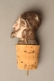 Cork bottle stopper with a porcelain finial depicting a Jewish stereotype