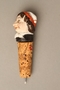 Cork bottle stopper with a porcelain finial depicting a Jewish stereotype