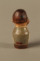 2016.184.36 back
Bottle stopper with a wooden finial depicting a Jewish stereotype

Click to enlarge